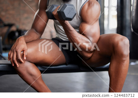 Gym man, exercise and biceps training with dumbell for weightlifting, fitness and bodybuilding at sports center. Power, muscle and guy bodybuilder arm with weights on physical, body and goal workout 124483712