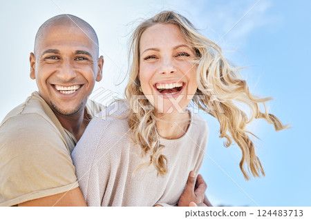 Love, blue sky and diversity couple hug, laugh and enjoy fun quality time together on travel vacation date. Happy, smile and romantic black man, woman or excited people bond on Toronto Canada holiday 124483713