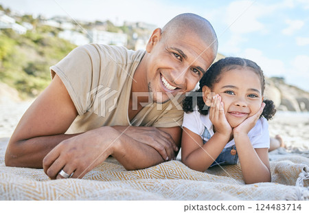 Dad, beach and girl lying in portrait with happy, smile and love together outdoor in sun. Black man, father and child at ocean, sea or sand for vacation, holiday and family in summer with blanket 124483714