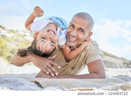 Family, beach and love with a girl and father on the sand by the coast during summer for a holiday or vacation. Travel, fun and portrait with a man and daughter bonding together on the seashore 124483722
