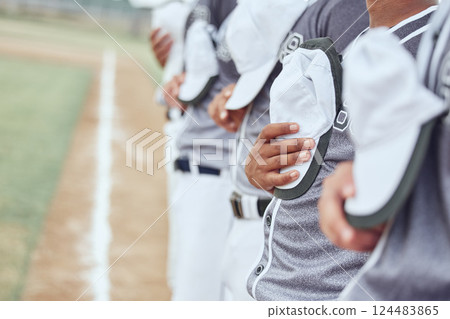 Baseball team, sports and national anthem to start event, competition games and motivation on stadium arena pitch. Closeup baseball players singing, patriotic group pride and respect for commitment Baseball team, sports and national anthem to start event, competition games and motivation on stadium arena pitch. Closeup baseball players singing, patriotic group pride and respect for commitment 124483865