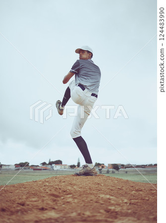 Man, baseball and pitcher in sports throw or competitive match to score point or win on the field outdoors. Professional baseball player in sport stance ready to pitch the ball in serious competition Man, baseball and pitcher in sports throw or competitive match to score point or win on the field outdoors. Professional baseball player in sport stance ready to pitch the ball in serious competition 124483990