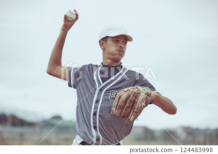 Baseball, baseball player and ball throw in baseball field in match, training game or competition. Sports, fitness and baseball pitcher man from India practice pitch outdoors for exercise or workout. 124483998