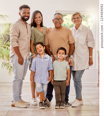 Happy family portrait with kids, parents and grandparents with smile standing in brazil home. Happiness, family and generations of men, women and children spending time together making fun memories. Happy family portrait with kids, parents and grandparents with smile standing in brazil home. Happiness, family and generations of men, women and children spending time together making fun memories. 124484092