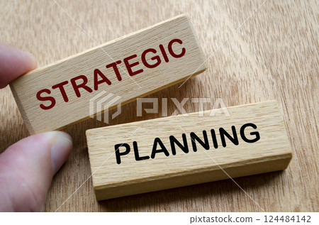 Strategic Planning text on wooden blocks. Business planning strategy concept. 124484142