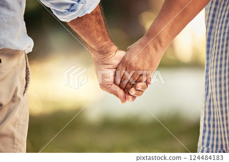 Old couple, love and holding hands for support in nature, park or outdoors walk. Retirement, romance and elderly, man and woman bonding, affection and enjoying time together outside in the morning. 124484183