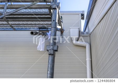 Roof repair work for detached houses - Rain gutters Roof repair work for detached houses - Rain gutters 124486804