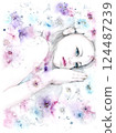 A girl sleeping surrounded by flowers 124487239