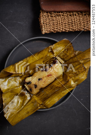 Close up sticky rice with banana, Thai dessert Close up sticky rice with banana, Thai dessert 124487553