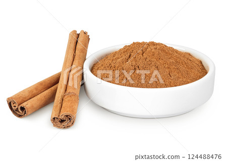 Cinnamon sticks with powder in ceramic bowl isolated on white background with full depth of field Cinnamon sticks with powder in ceramic bowl isolated on white background with full depth of field 124488476