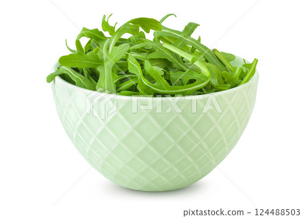 Heap of green fresh rucola or arugula leaf in ceramic bowl isolated on white background 124488503