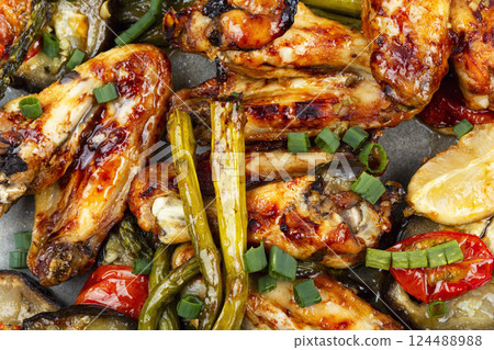 Plate of roast chicken wings. Plate of roast chicken wings. 124488988