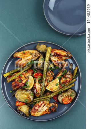 Hot and spicey chicken wings. 124488989