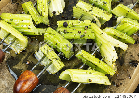 Healthy food, grilled celery on skewers. 124489007
