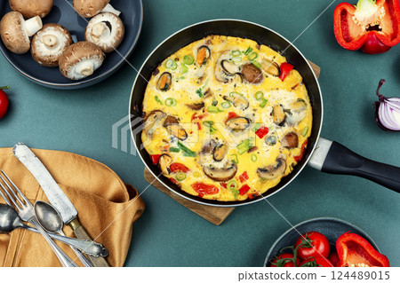 Omelette with mussels. 124489015