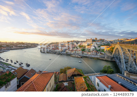 Golden Sunset Over Ponte Dom Luis I Bridge and Riverside in Porto, Portugal. Golden Sunset Over Ponte Dom Luis I Bridge and Riverside in Porto, Portugal. 124489379