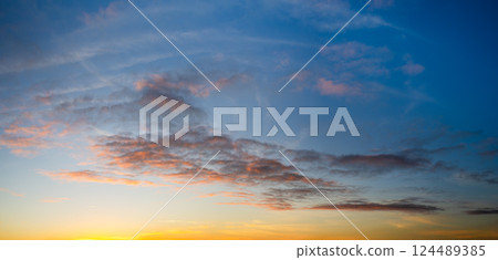 Sunset Sky in Porto, Golden Clouds at Dusk. 124489385