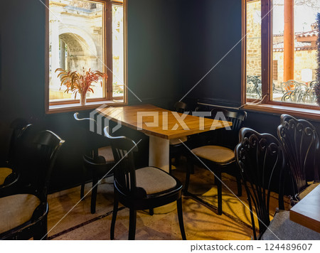 Dark interior in coffee shop. Dark interior in coffee shop. 124489607