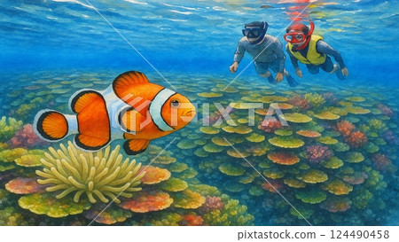 Snorkelers enjoying snorkeling while watching clownfish 124490458