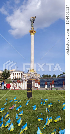 Kyiv, Ukraine May 23, 2022: Ukrainian flags in support of the Military Forces of Ukraine in the center of Kyiv during the war with Russia Kyiv, Ukraine May 23, 2022: Ukrainian flags in support of the Military Forces of Ukraine in the center of Kyiv during the war with Russia 124491134
