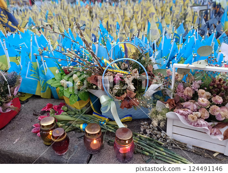 Kyiv, Ukraine March 15, 2024: Ukrainian flags in support of the Ukrainian Military Forces in the center of Kyiv during the war with Russia Kyiv, Ukraine March 15, 2024: Ukrainian flags in support of the Ukrainian Military Forces in the center of Kyiv during the war with Russia 124491146