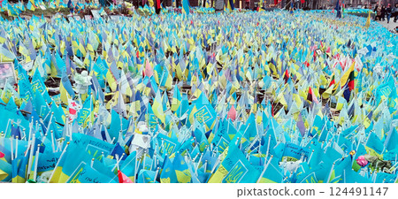 Kyiv, Ukraine March 15, 2024: Ukrainian flags in support of the Ukrainian Military Forces in the center of Kyiv during the war with Russia Kyiv, Ukraine March 15, 2024: Ukrainian flags in support of the Ukrainian Military Forces in the center of Kyiv during the war with Russia 124491147