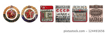 Kiev, Ukraine August 16, 2021: Badges of sports ranks from the third to the master of sports of international class of the era of the Soviet Union 124491656