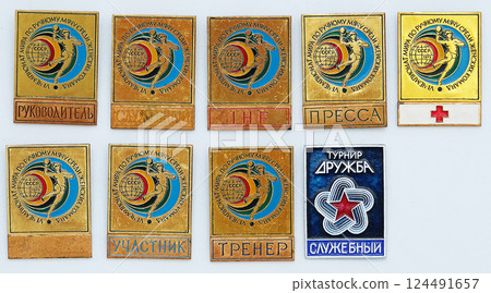 Kiev, Ukraine August 16, 2021: Lapel badges of the participants of the World Handball Championship of the USSR era 124491657