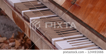 Old piano in the park for everyone to play in KievOld piano in the park for everyone to play in Kiev 124491666