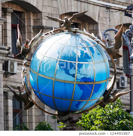 Monument Globe - zero kilometer sign in the center of Kiev with distances to the capitals of the world 124491987