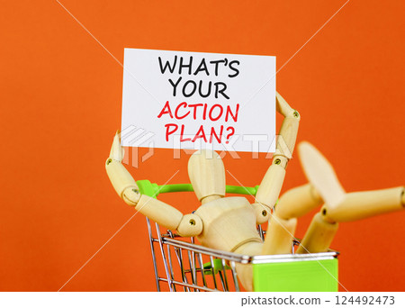 Action plan symbol. Concept words What is your action plan on beautiful white paper. Beautiful orange background. Businessman model. Business What is your action plan concept. Copy space 124492473