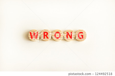 Wrong symbol. Concept word Wrong on beautiful wooden circles. Beautiful white table white background. Business lifestyle wrong concept. Copy space. Wrong symbol. Concept word Wrong on beautiful wooden circles. Beautiful white table white background. Business lifestyle wrong concept. Copy space. 124492518