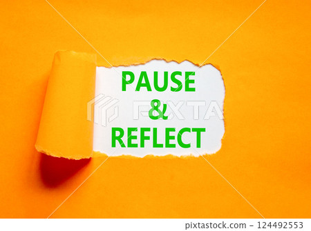 Pause and reflect symbol. Concept words Pause and reflect on beautiful white paper. Beautiful orange paper background. Business motivational lifestyle pause and reflect concept. Copy space. 124492553