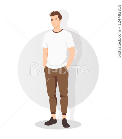 Stylish Young Man in White T-Shirt and Brown Casual Pants Standing in Relaxed Pose. A modern young man wearing a white t-shirt, brown casual trousers, and stylish sneakers. 124492819
