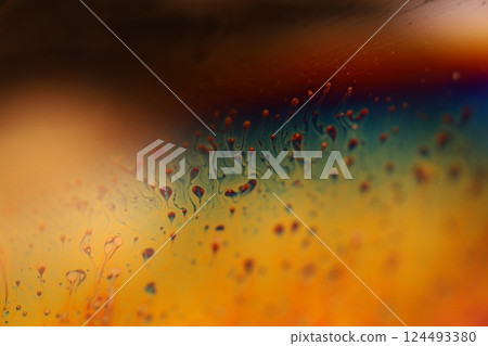 Green liquid surface, colourful abstract, surrealistic art, line of light, black background, beautiful scientific background 124493380