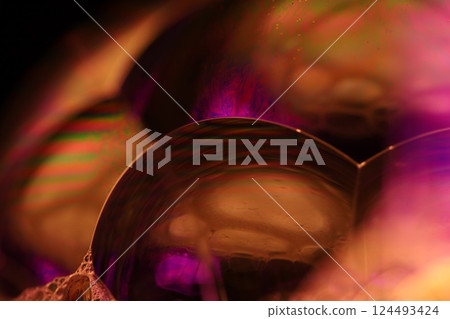 Green liquid surface, colourful abstract, surrealistic art, line of light, black background, beautiful scientific background 124493424