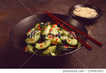 Chinese salad, cucumbers with chili pepper and sesame seeds, homemade, no people, Chinese salad, cucumbers with chili pepper and sesame seeds, homemade, no people, 124493845