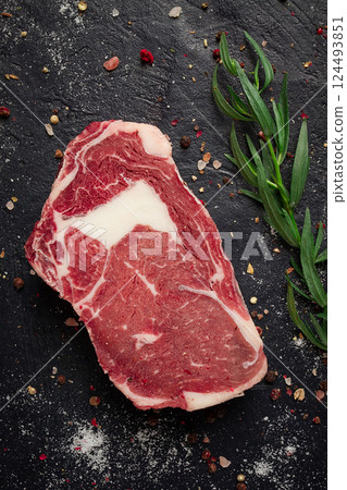 fresh, raw rib eye steak, top view, 124493851