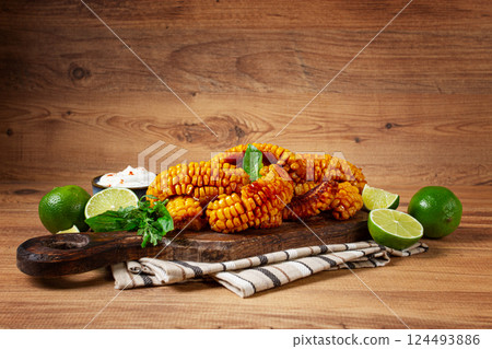 corn ribs, with cream sauce , spices and lime, appetizer, homemade, no people, 124493886