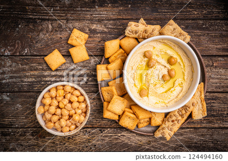 Various hummus dips, healthy and vegan snack Various hummus dips, healthy and vegan snack 124494160