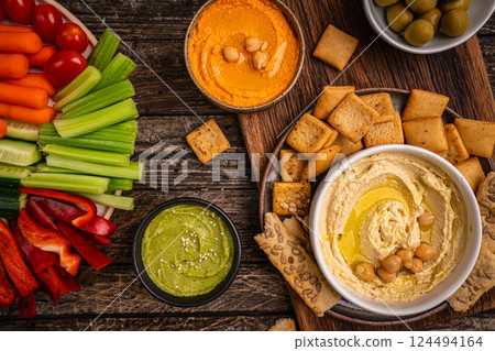 Various hummus dips, healthy and vegan snack Various hummus dips, healthy and vegan snack 124494164
