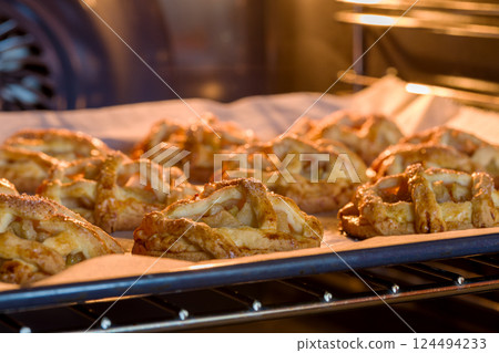 Homemade mini apple pies. Close-up Homemade mini apple pies. Close-up 124494233