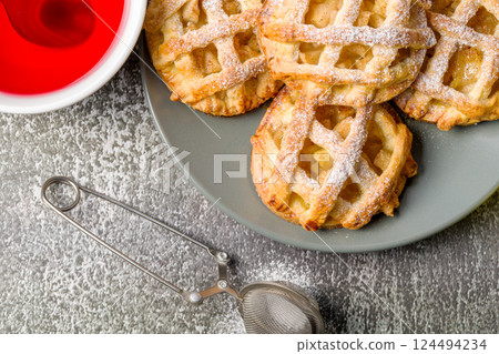 Homemade mini apple pies. Close-up Homemade mini apple pies. Close-up 124494234