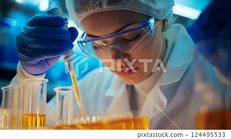 lab worker in a medical lab coat with test tubes lab worker in a medical lab coat with test tubes 124495533
