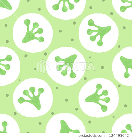 Seamless green polka dot pattern with frog footprints 124495642