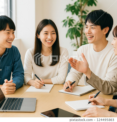 A moment of hands clasped together symbolizing unity in a business team | Image of teamwork and cooperation 124495863
