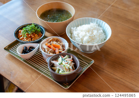 Enjoy a Japanese breakfast with rice and small side dishes Enjoy a Japanese breakfast with rice and small side dishes 124495865