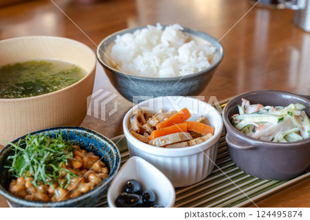 Enjoy a Japanese breakfast with rice and small side dishes Enjoy a Japanese breakfast with rice and small side dishes 124495874