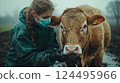 Veterinarian examine cow with foot-and-mouth disease. Created with Generative AI technology. 124495966