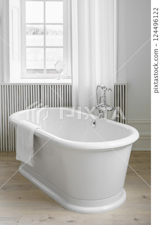 Modern elegant minimalist bathroom interior with curtains and window and freestanding bathtub Modern elegant minimalist bathroom interior with curtains and window and freestanding bathtub 124496122